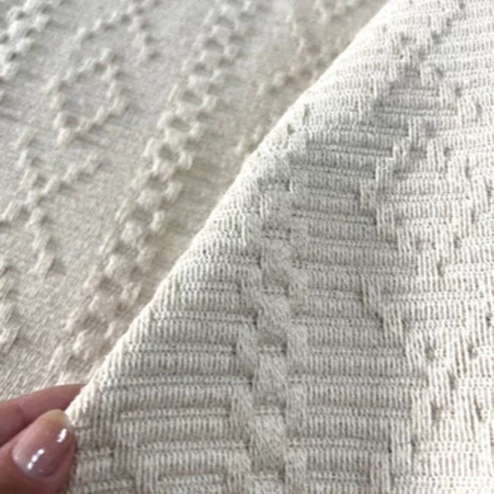 Textura em relevo do tapete de algodão cru