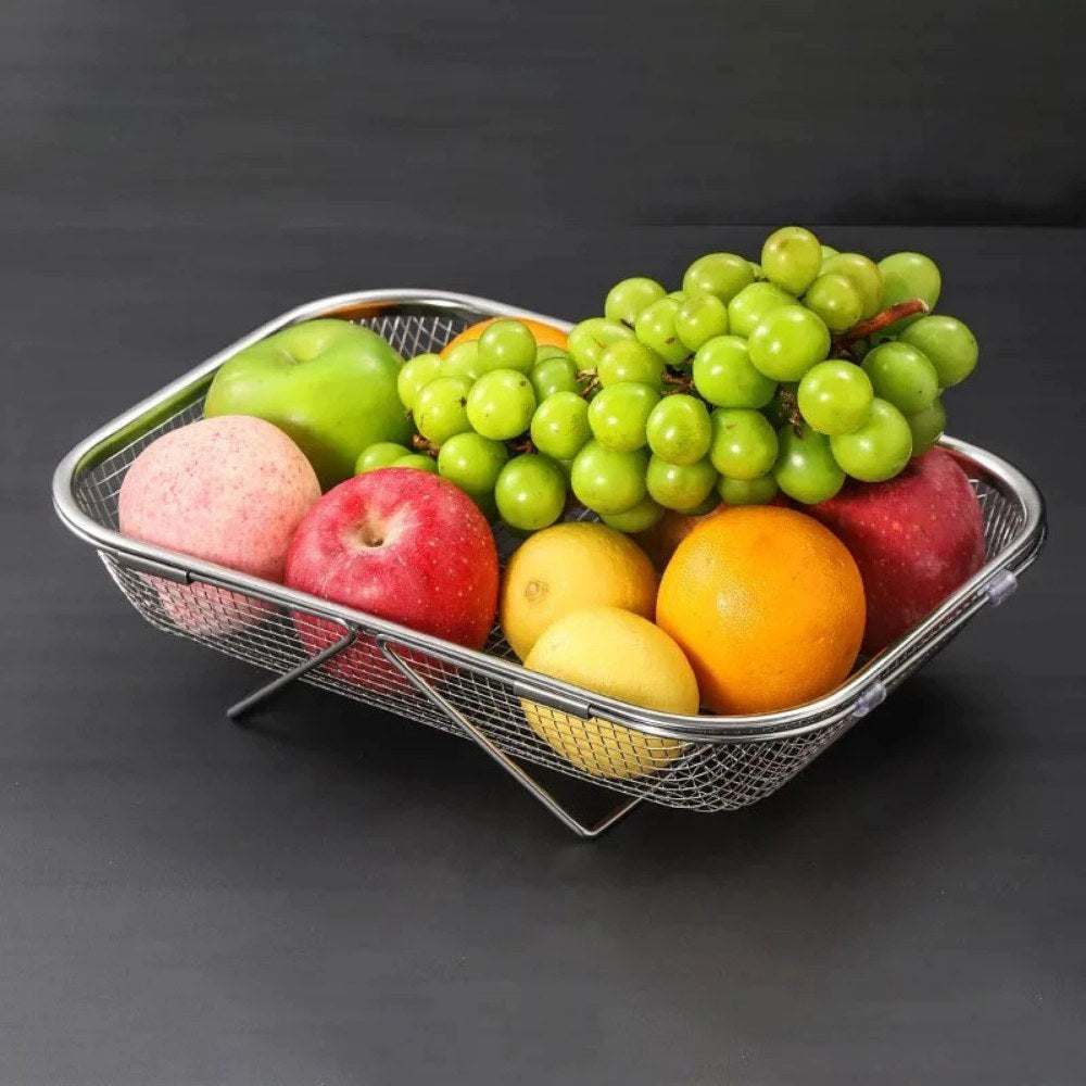 Escorredor inox usado como fruteira com frutas
